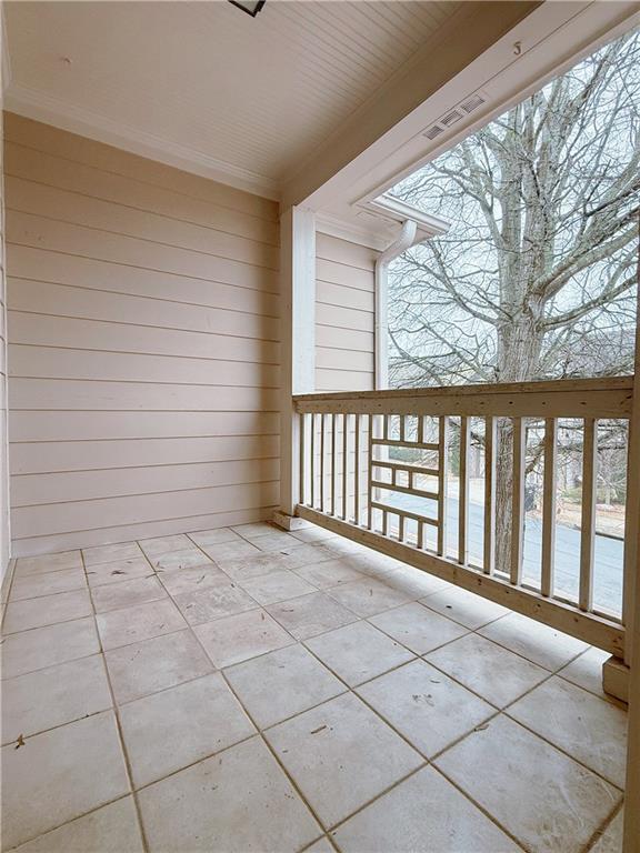 5691 Apple Grove Road Northeast Buford, GA 30519 - Photo 21 of 23 a view of a porch with wooden floor