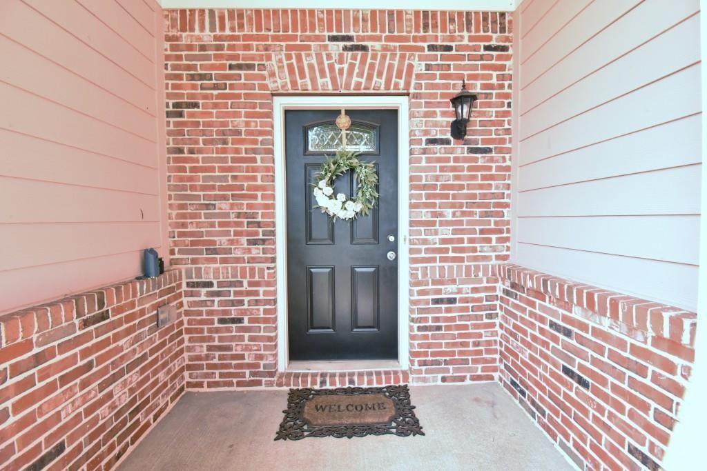 5691 Apple Grove Road Northeast Buford, GA 30519 - Photo 3 of 23 a view of front door of house