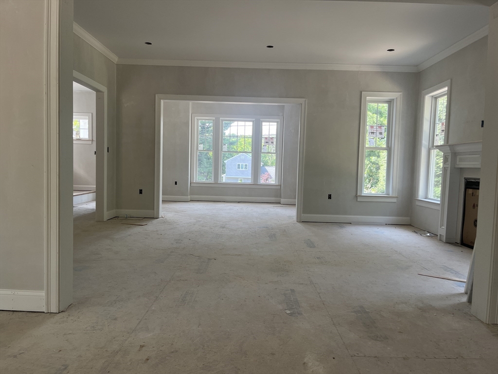 485 Main Street Millis, MA 02054 - Photo 11 of 31 an empty room with windows and closet