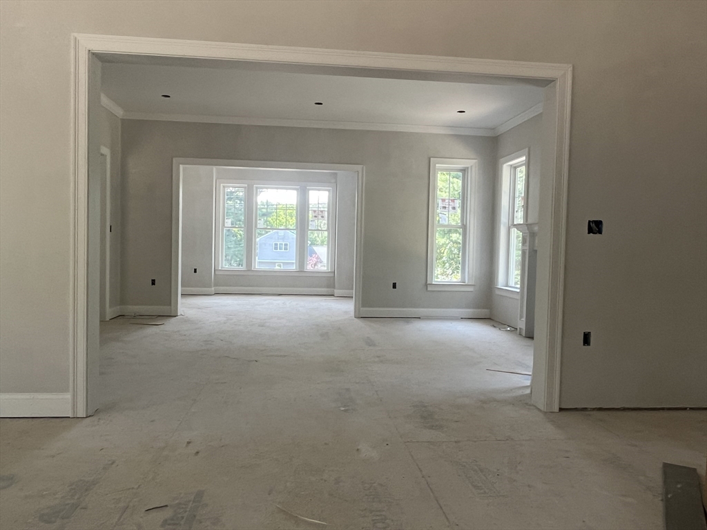 485 Main Street Millis, MA 02054 - Photo 12 of 31 a view of livingroom with entryway and window