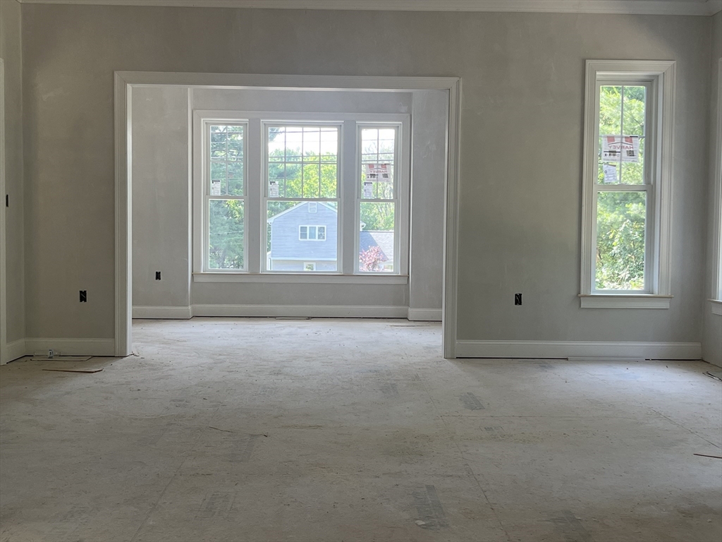 485 Main Street Millis, MA 02054 - Photo 13 of 31 an empty room with windows