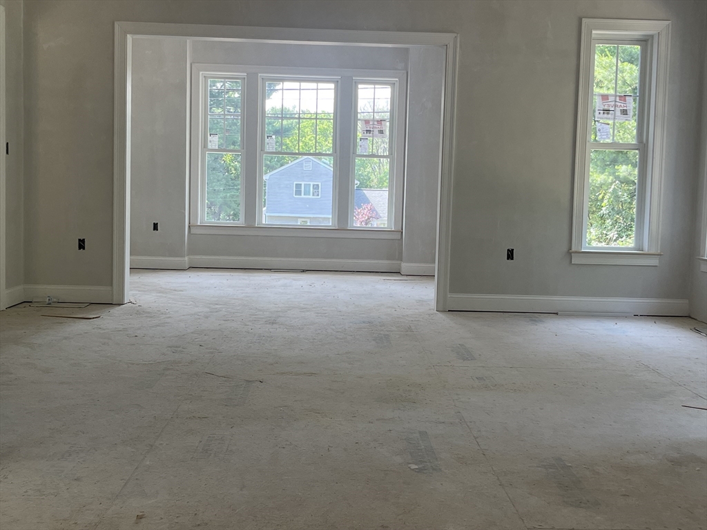 485 Main Street Millis, MA 02054 - Photo 14 of 31 a view of an empty room with a window