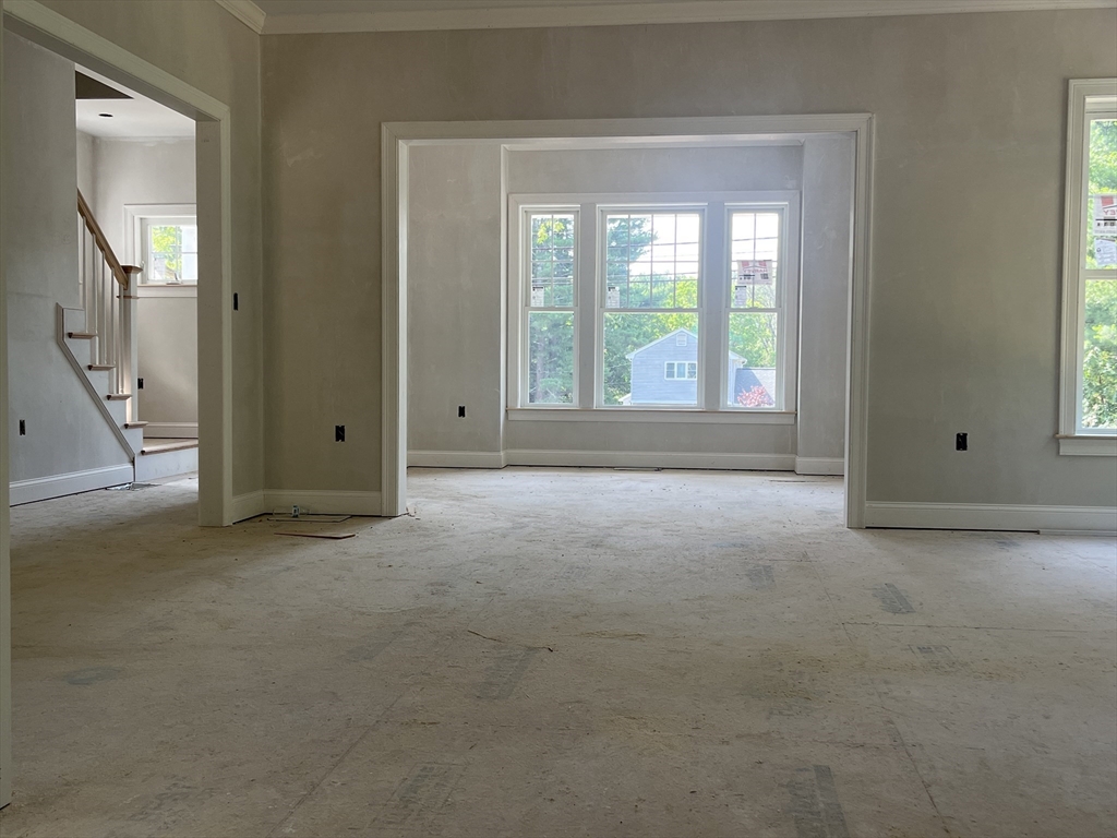 485 Main Street Millis, MA 02054 - Photo 17 of 31 an empty room that has a window