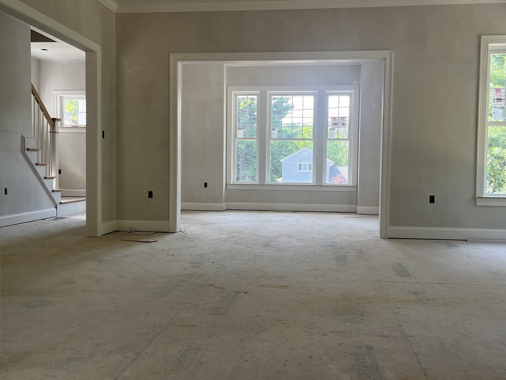 485 Main Street Millis, MA 02054 - Photo 18 of 31 an empty room that has a window