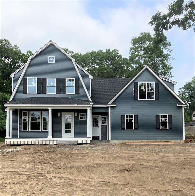485 Main Street Millis, MA 02054 - Photo 27 of 31 front view of a house with a yard