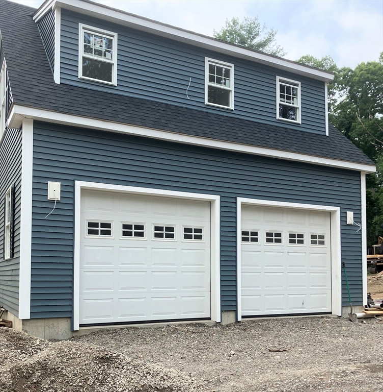 485 Main Street Millis, MA 02054 - Photo 28 of 31 a view of a house with white door and door
