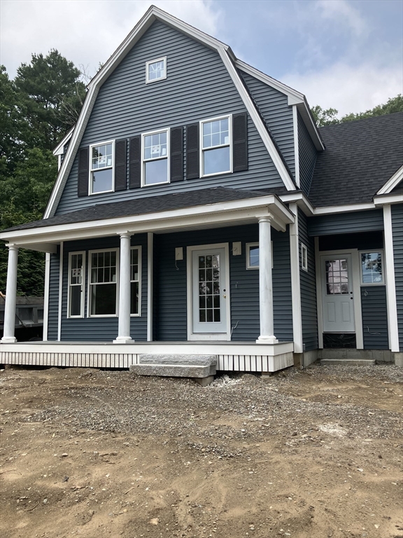 485 Main Street Millis, MA 02054 - Photo 29 of 31 a front view of a house with garden