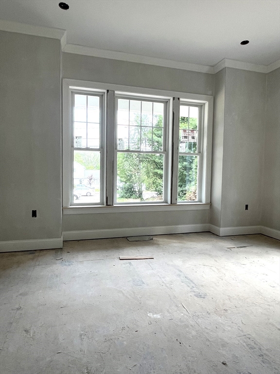 485 Main Street Millis, MA 02054 - Photo 4 of 31 a view of an empty room with a window