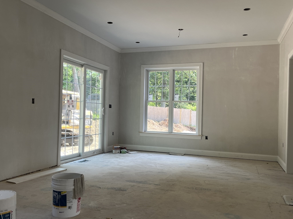 485 Main Street Millis, MA 02054 - Photo 9 of 31 an empty room with windows