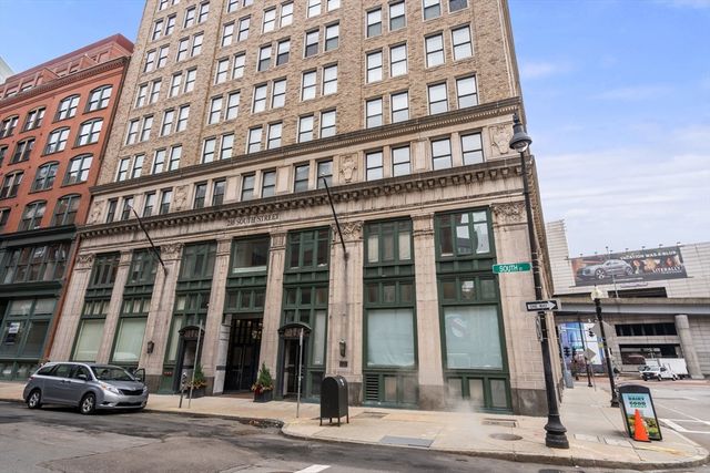 a view of a building and a street