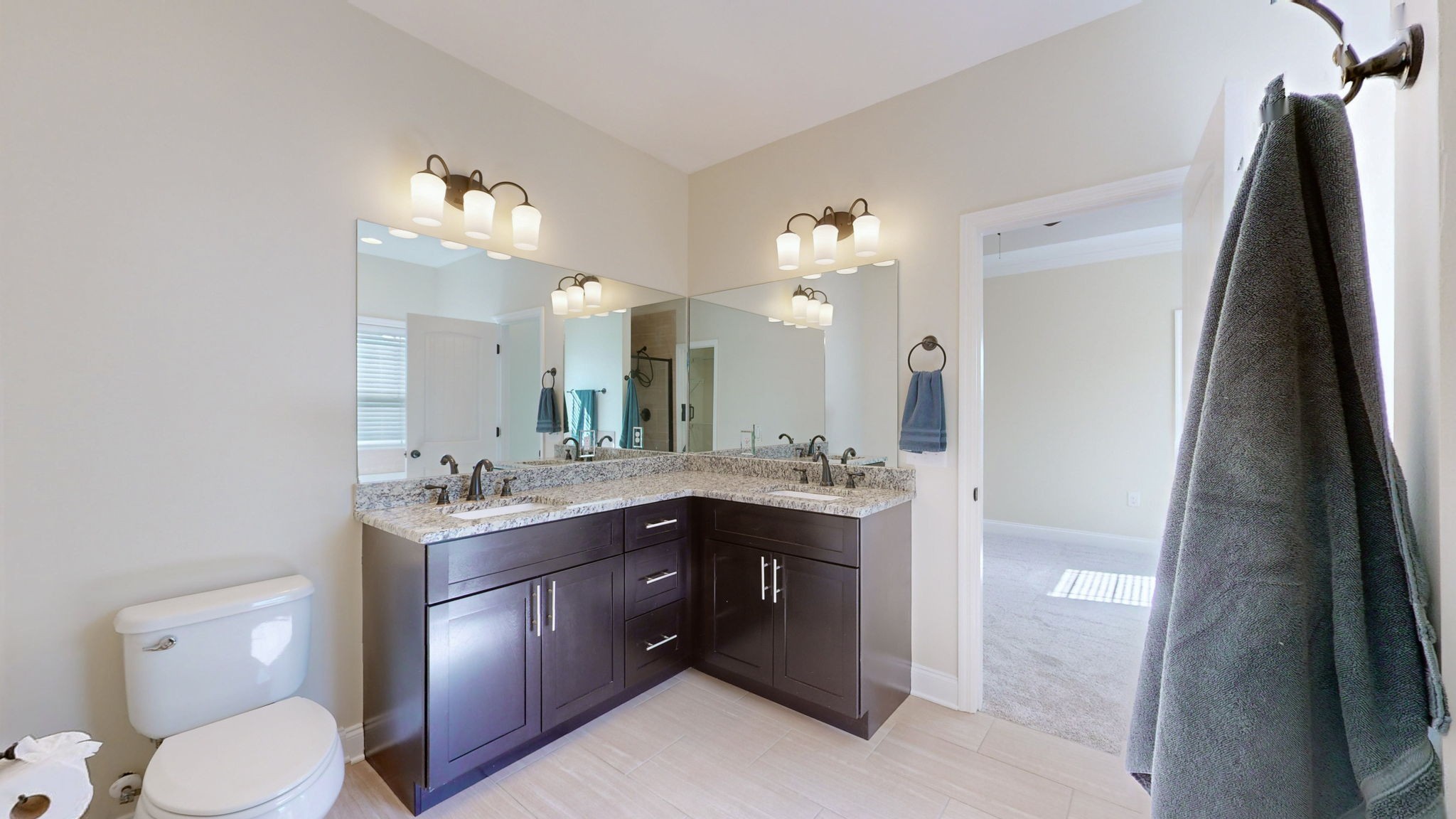 2155 Turner Road Watertown, TN 37184 - Photo 13 of 49 a bathroom with a toilet sink and mirror