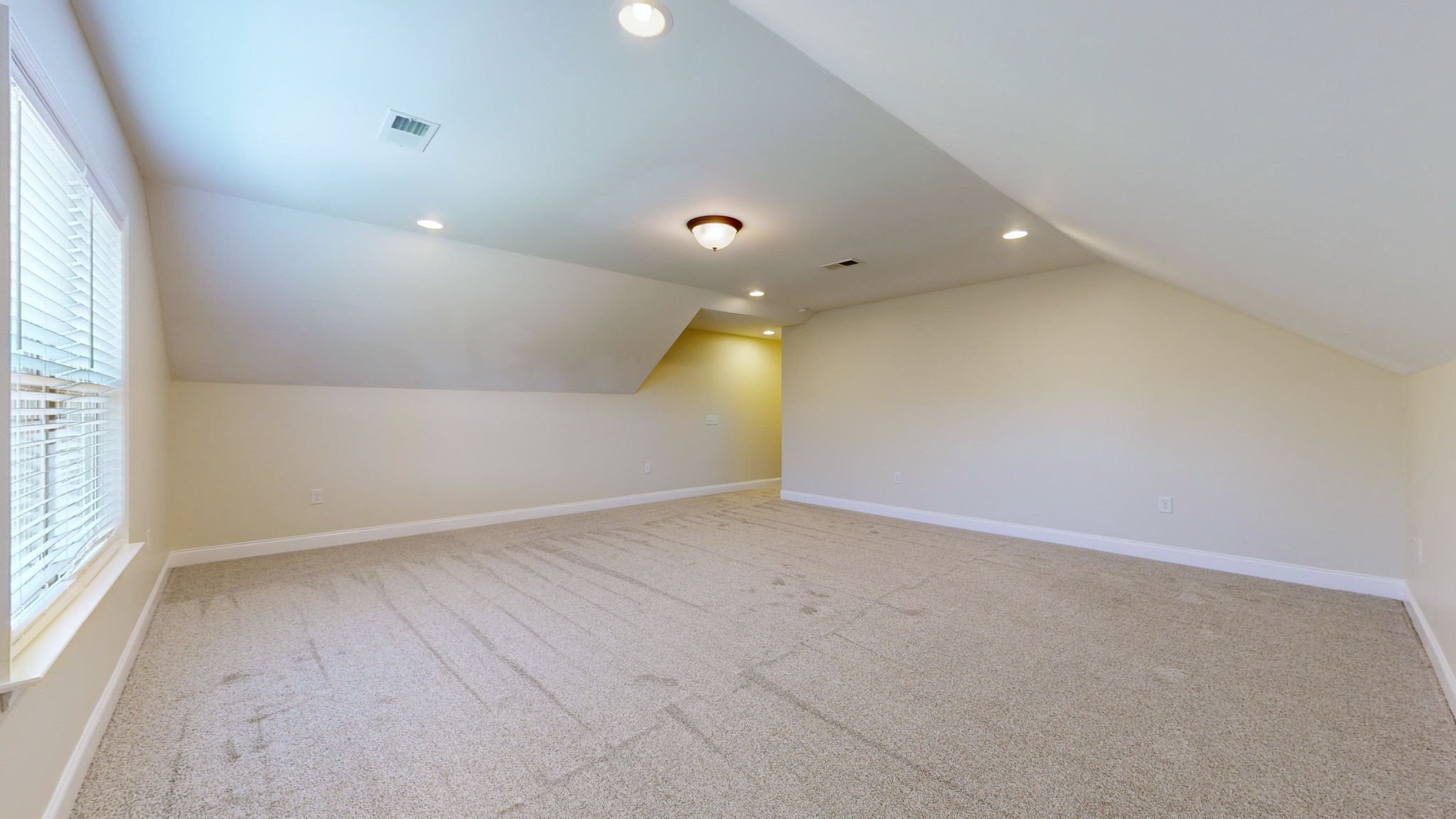 2155 Turner Road Watertown, TN 37184 - Photo 18 of 49 an empty room with a window and a projector screen