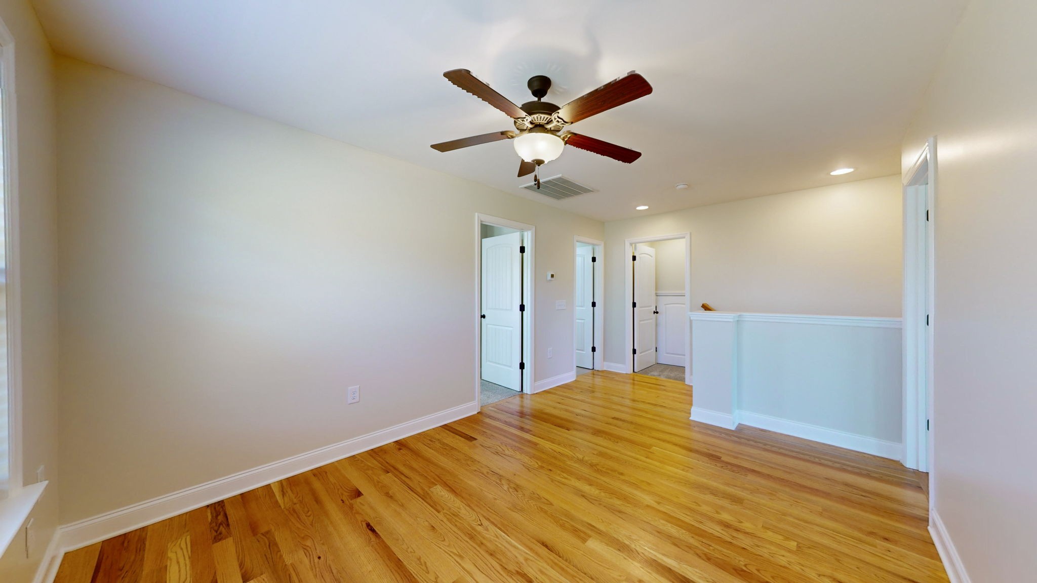 2155 Turner Road Watertown, TN 37184 - Photo 21 of 49 a view of a big room with wooden floor and a ceiling fan