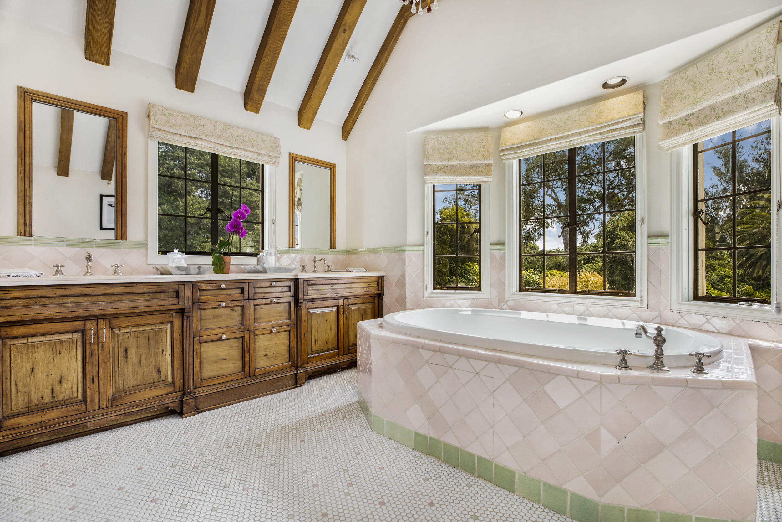 165 Middle Road Santa Barbara, CA 93108 - Photo 29 of 38 a spacious bathroom with a granite countertop tub sink mirror next to a window