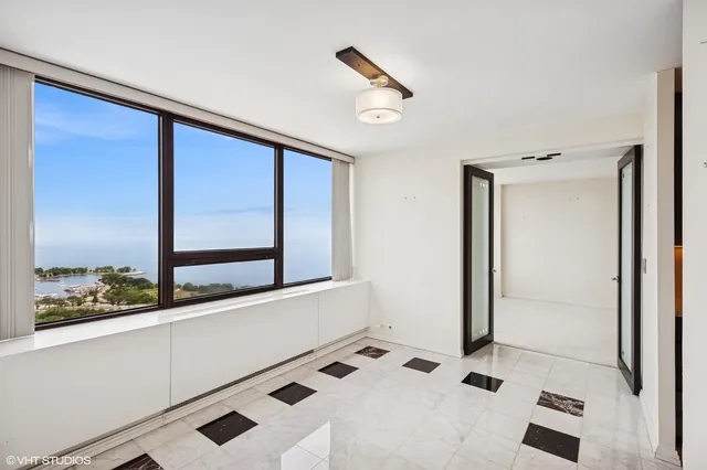 a view of bathroom with a window dryer and a shower