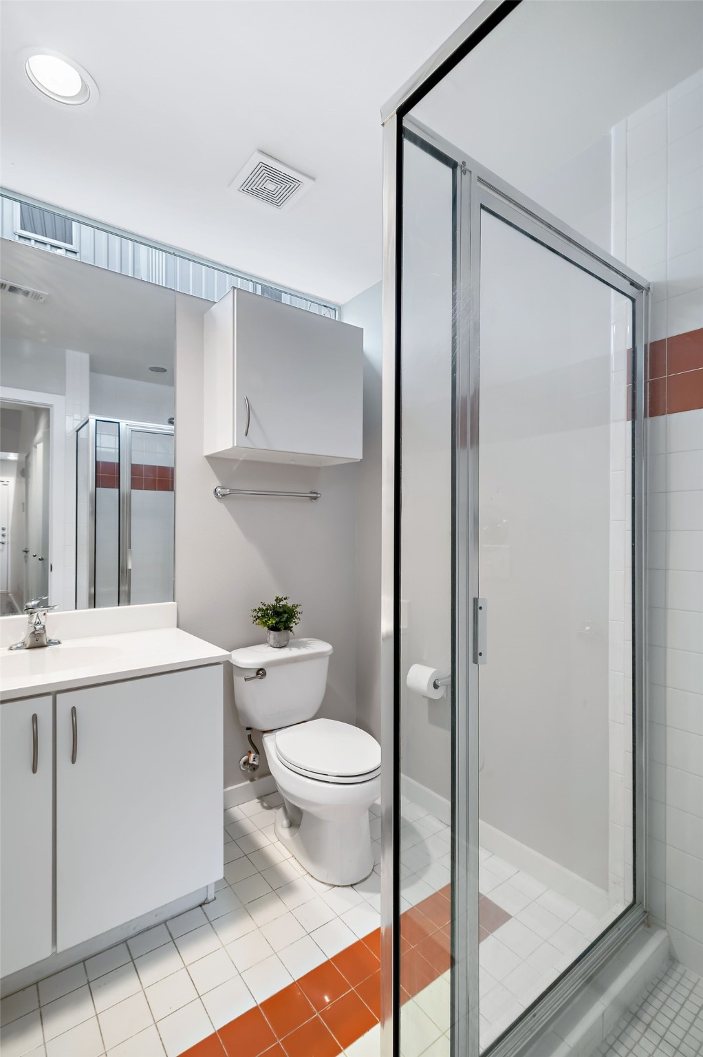 2605 Calumet Street, Unit 34 Houston, TX 77004 - Photo 13 of 37 a bathroom with a sink a toilet and shower