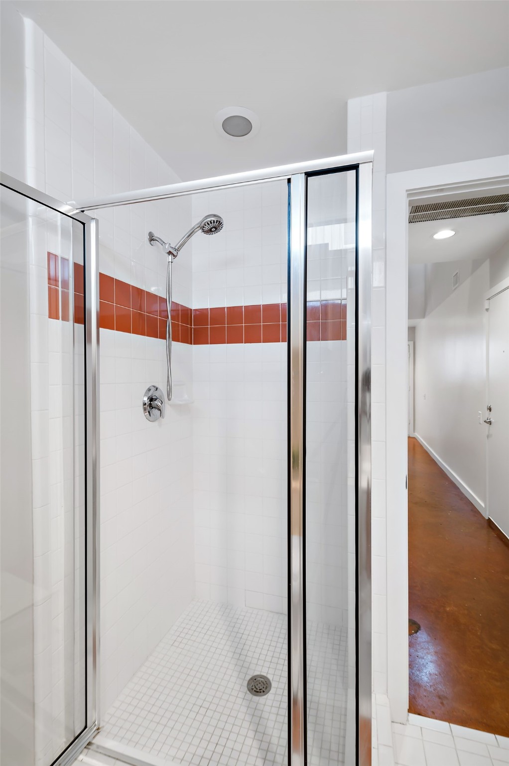 2605 Calumet Street, Unit 34 Houston, TX 77004 - Photo 14 of 37 a bathroom with a glass shower door