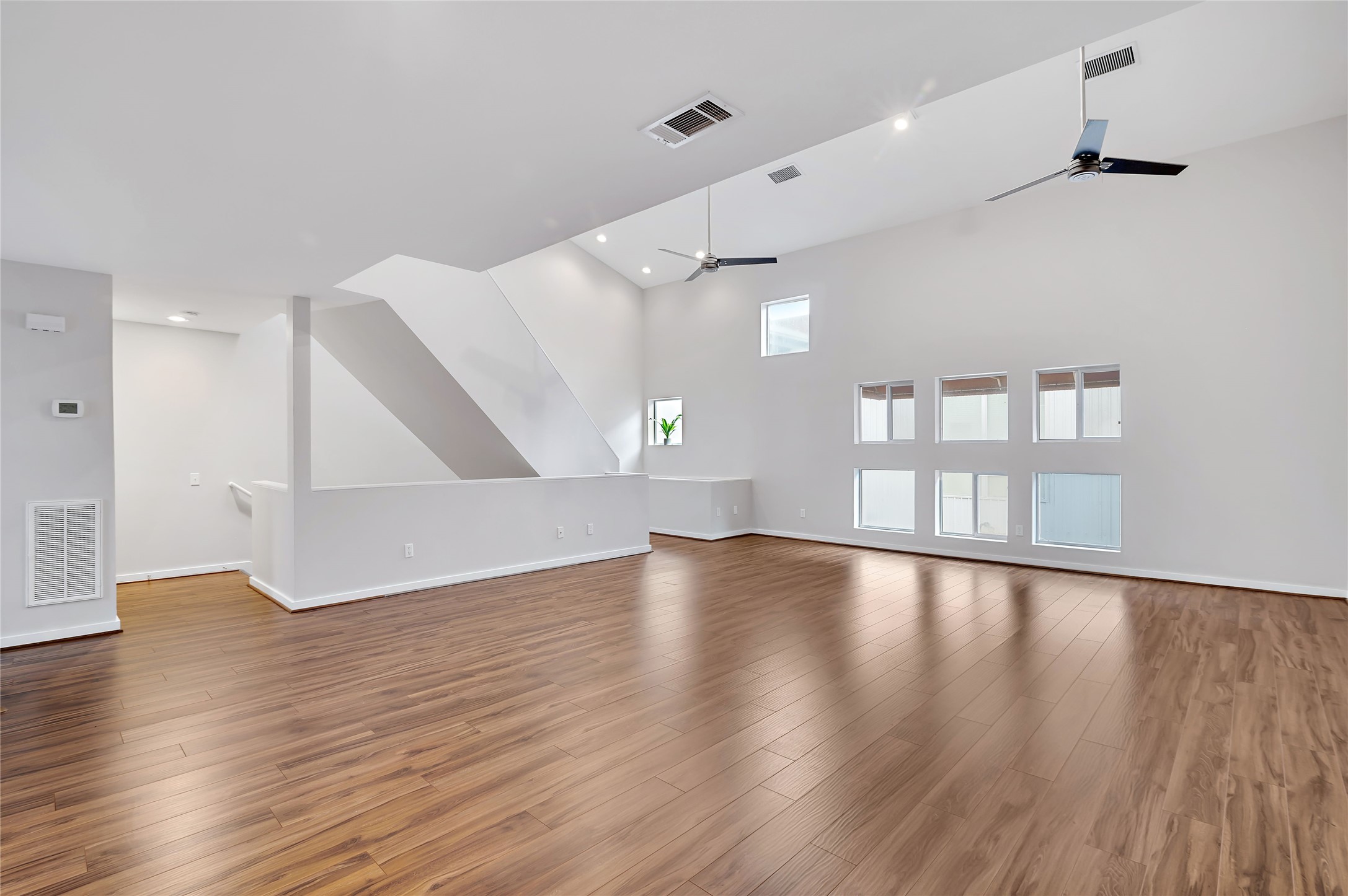 2605 Calumet Street, Unit 34 Houston, TX 77004 - Photo 37 of 37 a view of empty room with wooden floor and fan