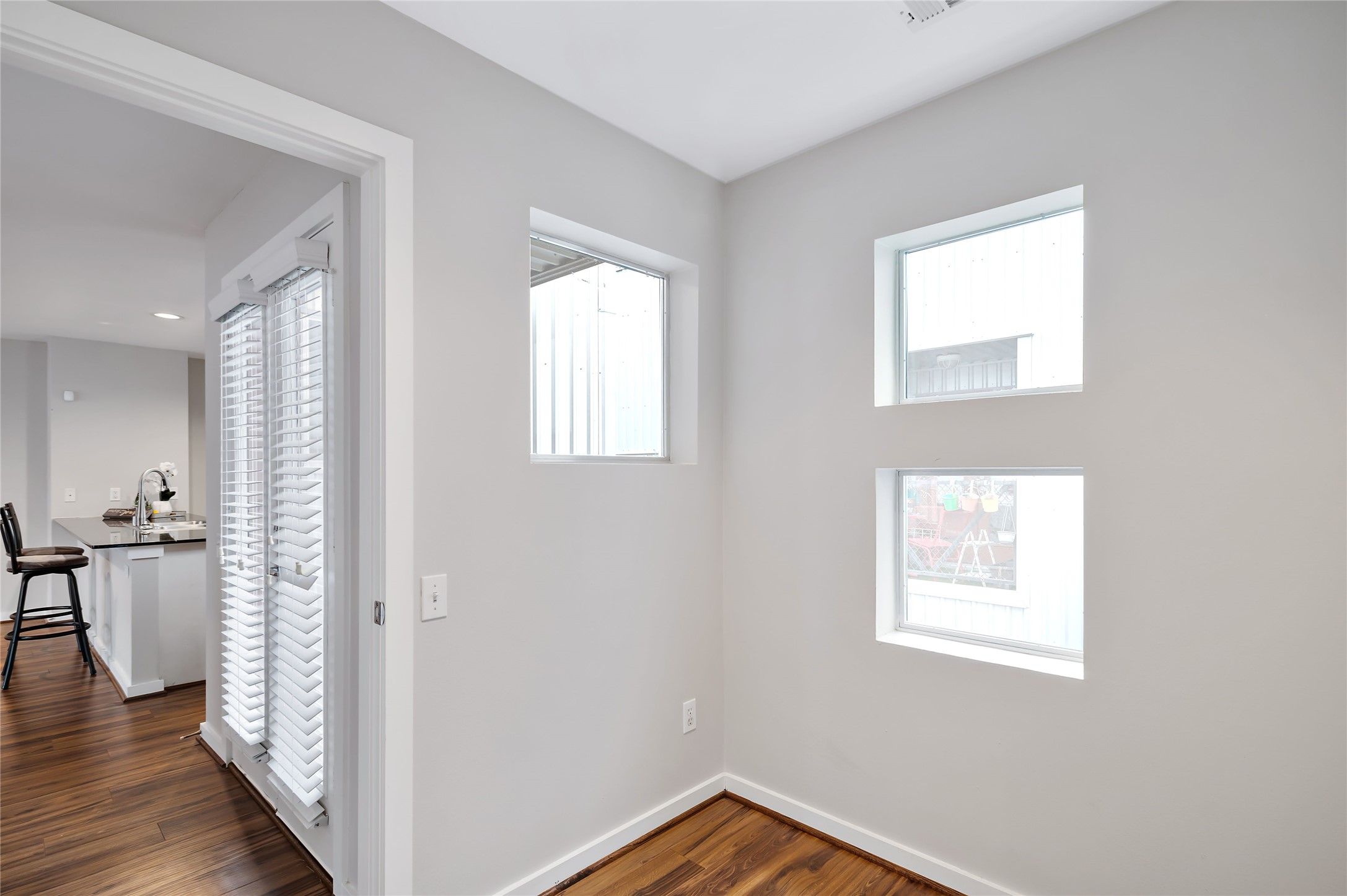 2605 Calumet Street, Unit 34 Houston, TX 77004 - Photo 23 of 37 a view of a hallway with wooden floor and a window