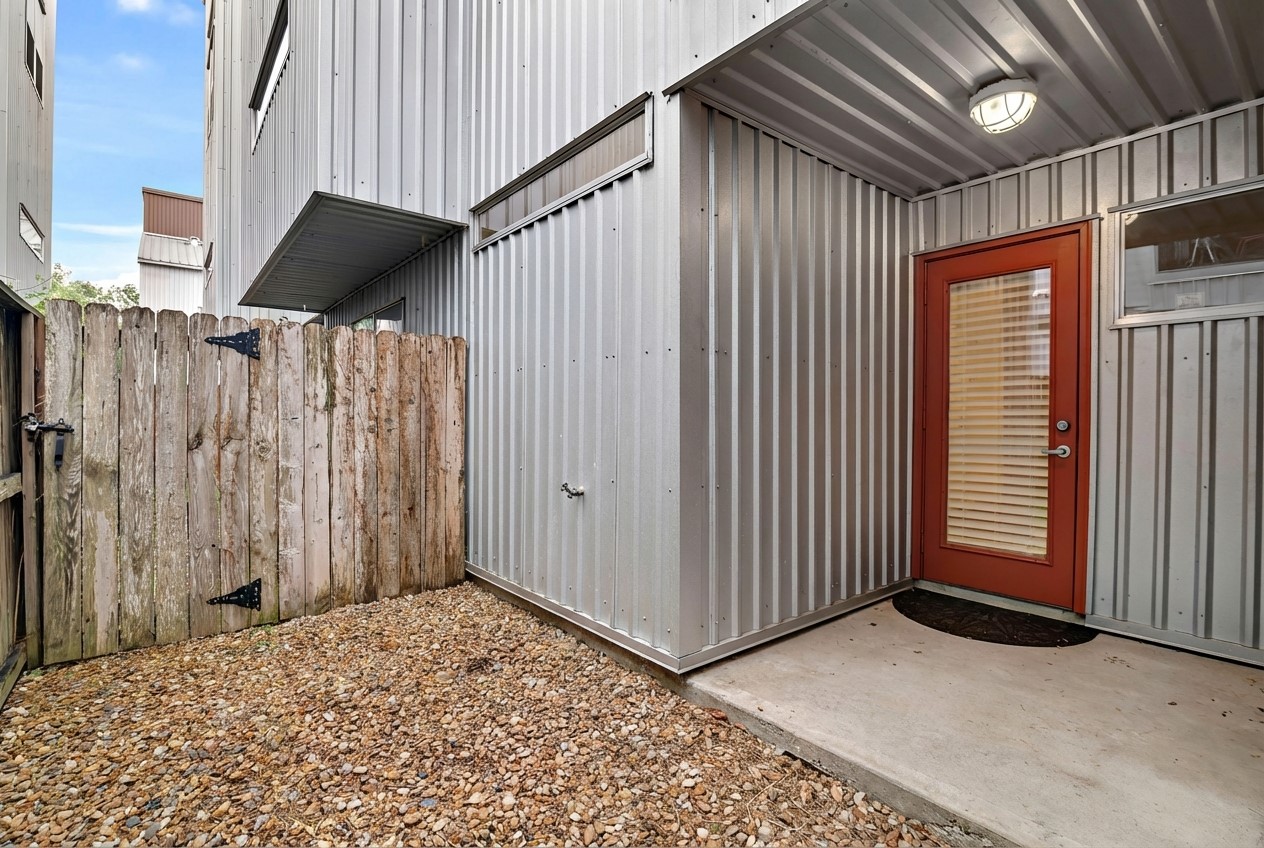 2605 Calumet Street, Unit 34 Houston, TX 77004 - Photo 5 of 37 a view of a house with a wooden door