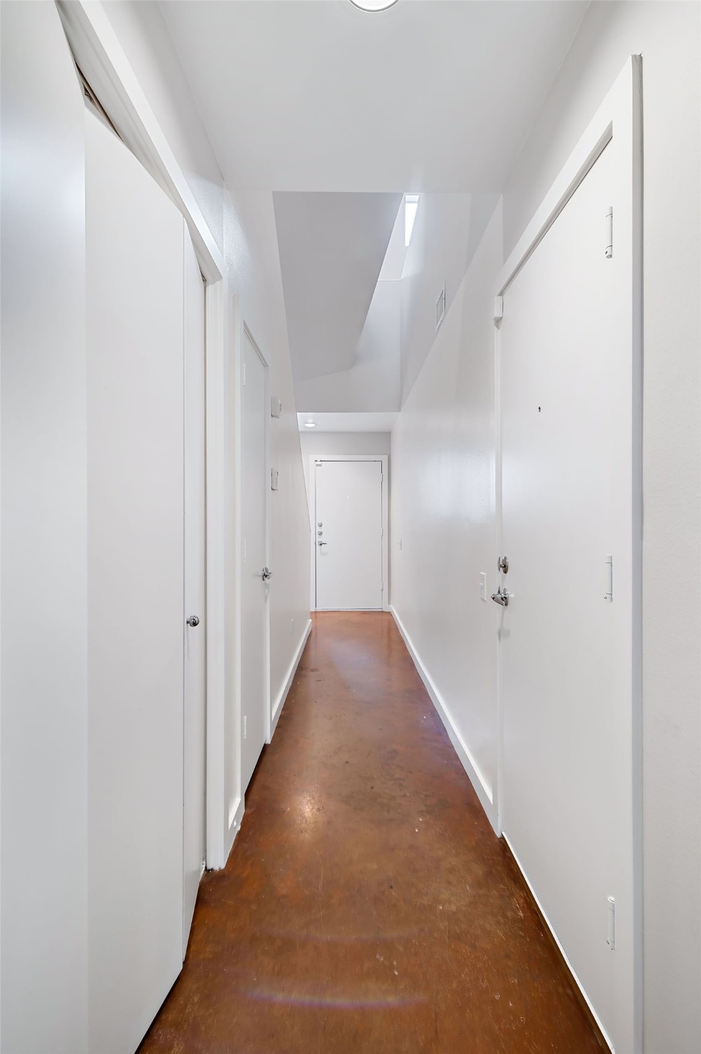 2605 Calumet Street, Unit 34 Houston, TX 77004 - Photo 8 of 37 a view of hallway with wooden floor