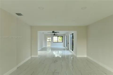 a view of hallway with livingroom