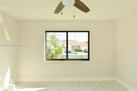 a view of a room that has a window