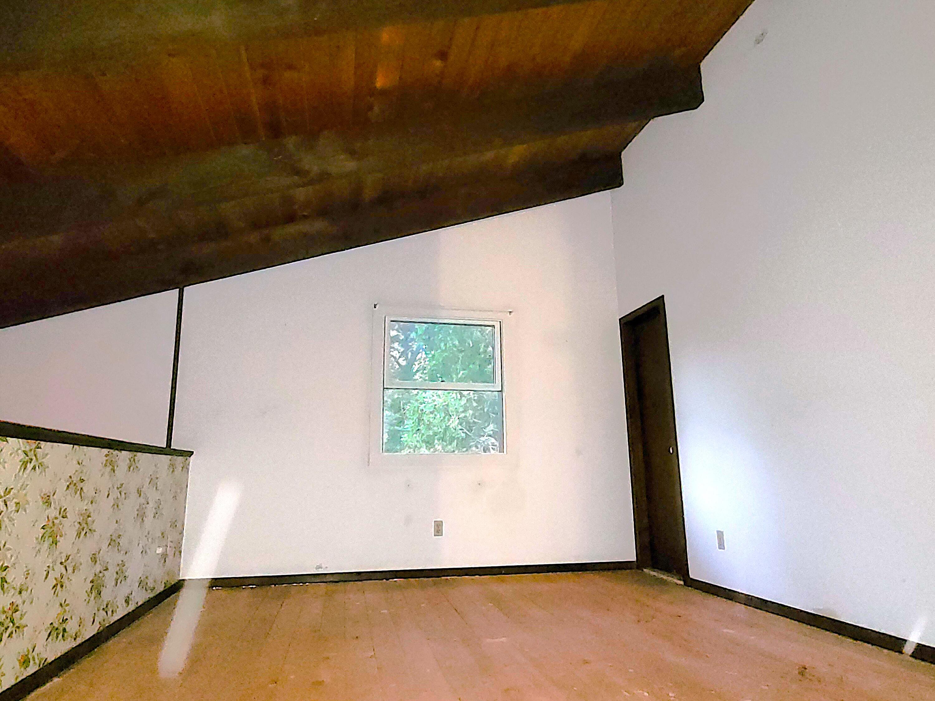 277 Lund Farm Way Brewster, MA 02631 - Photo 36 of 56 a view of an empty room with a window