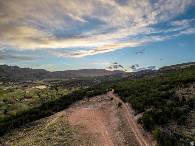 8094 West Red Cloud Loop Road Vernal, UT 84078 - Photo 1 of 35 Late afternoon skies over the 10 acres