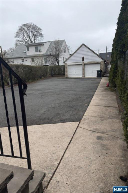 48 Hancox Avenue Nutley, NJ 07110 - Photo 14 of 15 a front view of a house with a yard