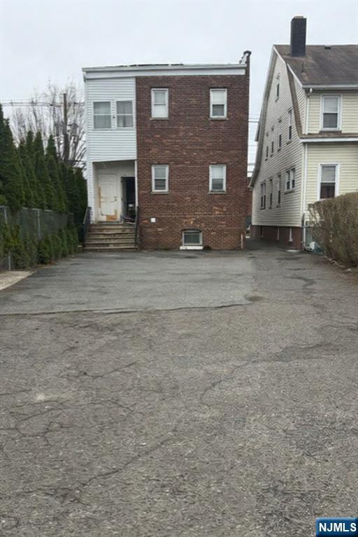 48 Hancox Avenue Nutley, NJ 07110 - Photo 15 of 15 front view of house with a street