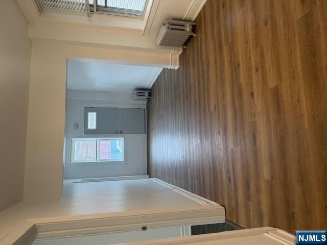 48 Hancox Avenue Nutley, NJ 07110 - Photo 3 of 15 a view of a room with wooden floor and staircase