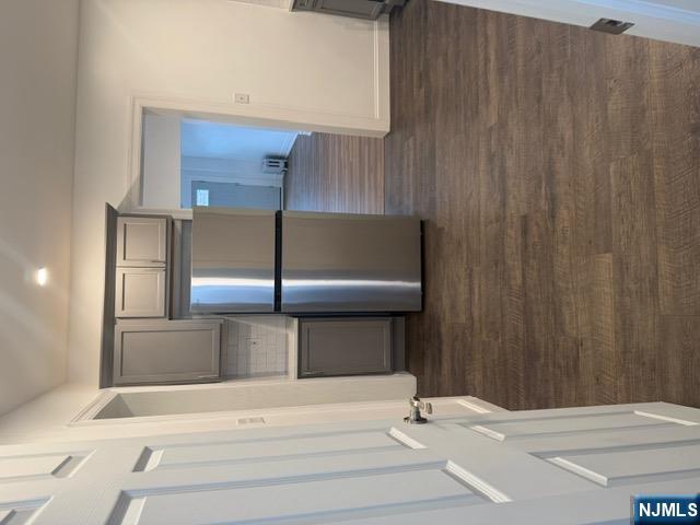 48 Hancox Avenue Nutley, NJ 07110 - Photo 7 of 15 a kitchen with a refrigerator and a sink