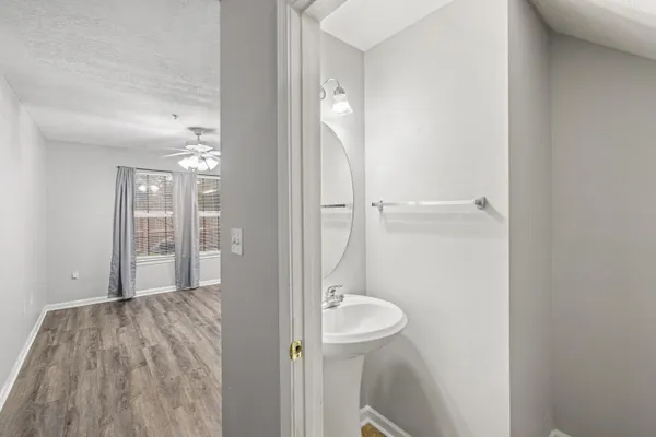 a bathroom with a sink and toilet