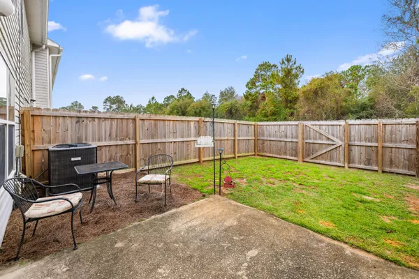 a view of a yard with a patio