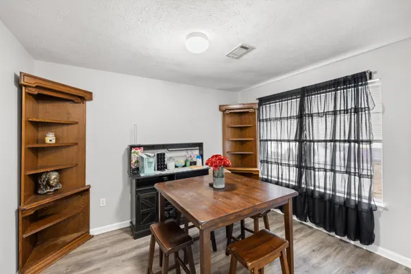 a view of a workspace with furniture