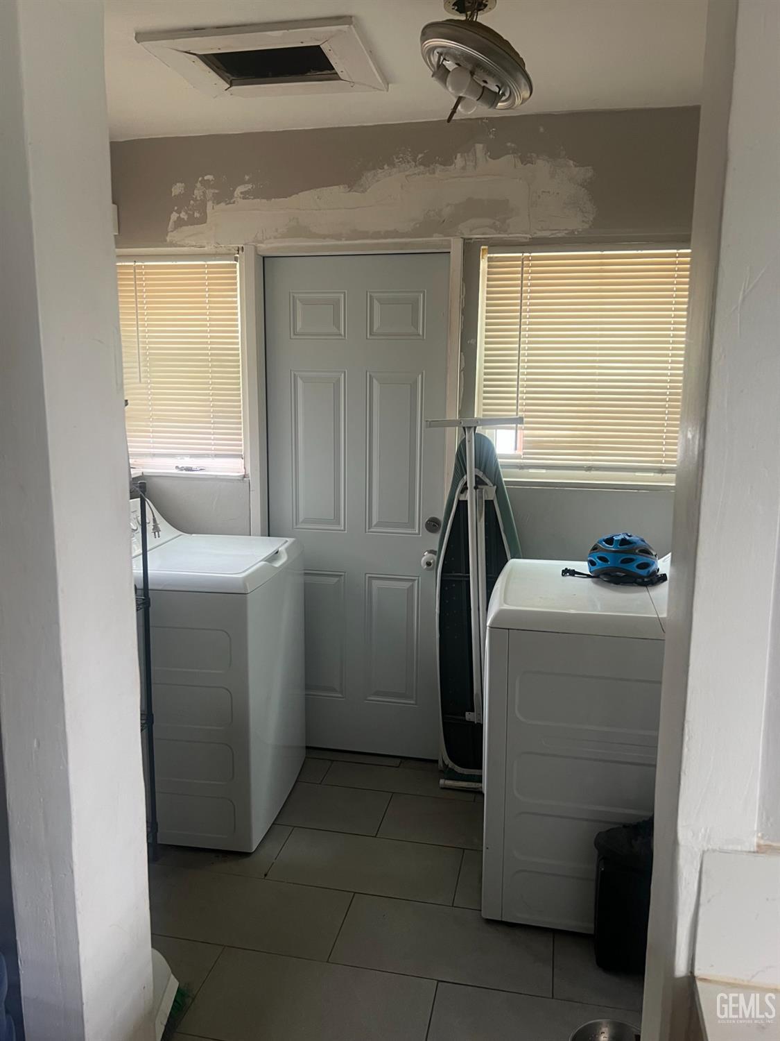 Undisclosed Address Visalia, CA 93291 - Photo 13 of 33 a room with storage and utility