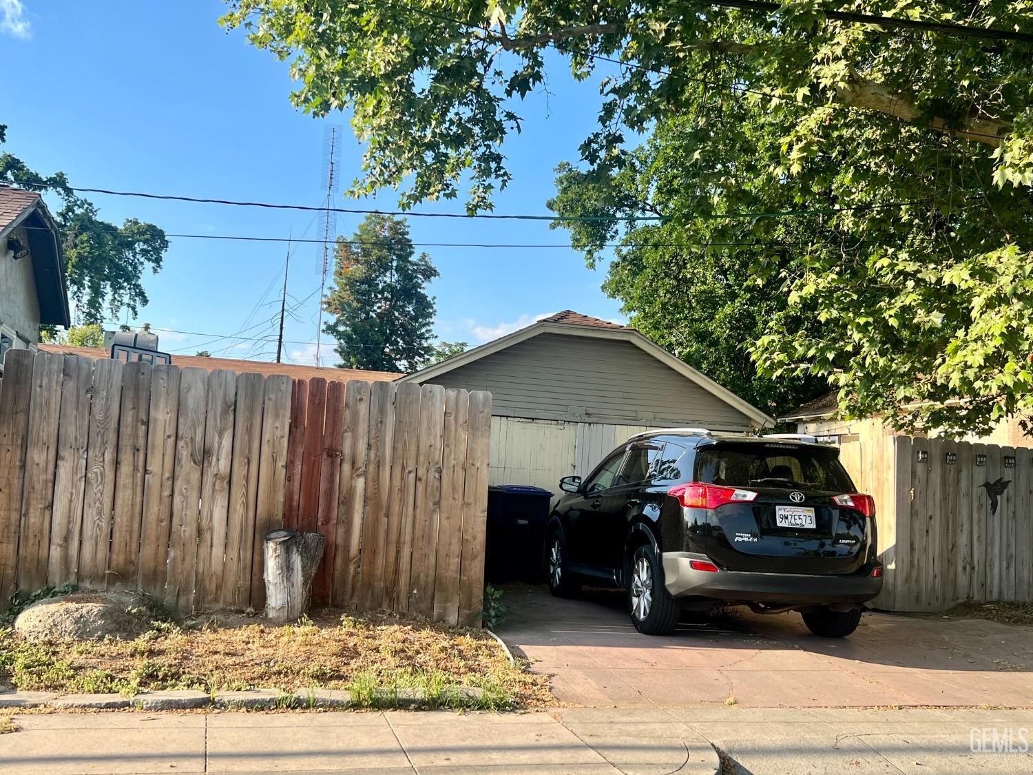 Undisclosed Address Visalia, CA 93291 - Photo 17 of 33 a car parked in front of a house