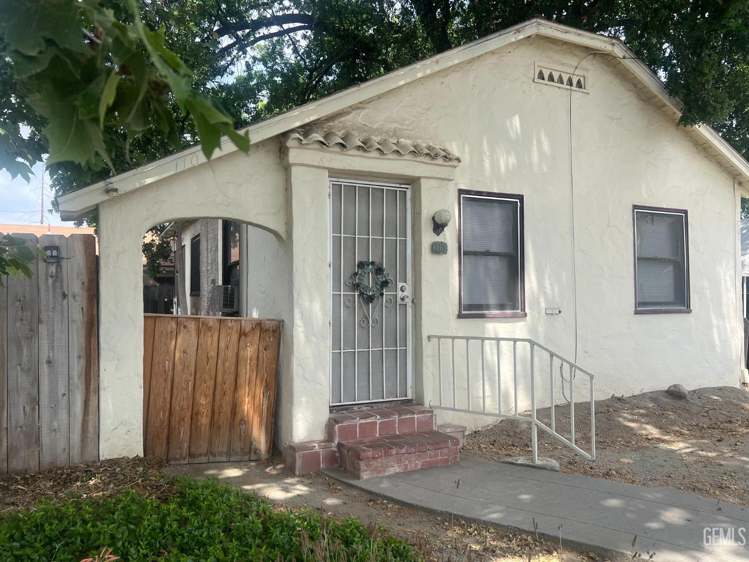 Undisclosed Address Visalia, CA 93291 - Photo 19 of 33 a front view of a house with a yard