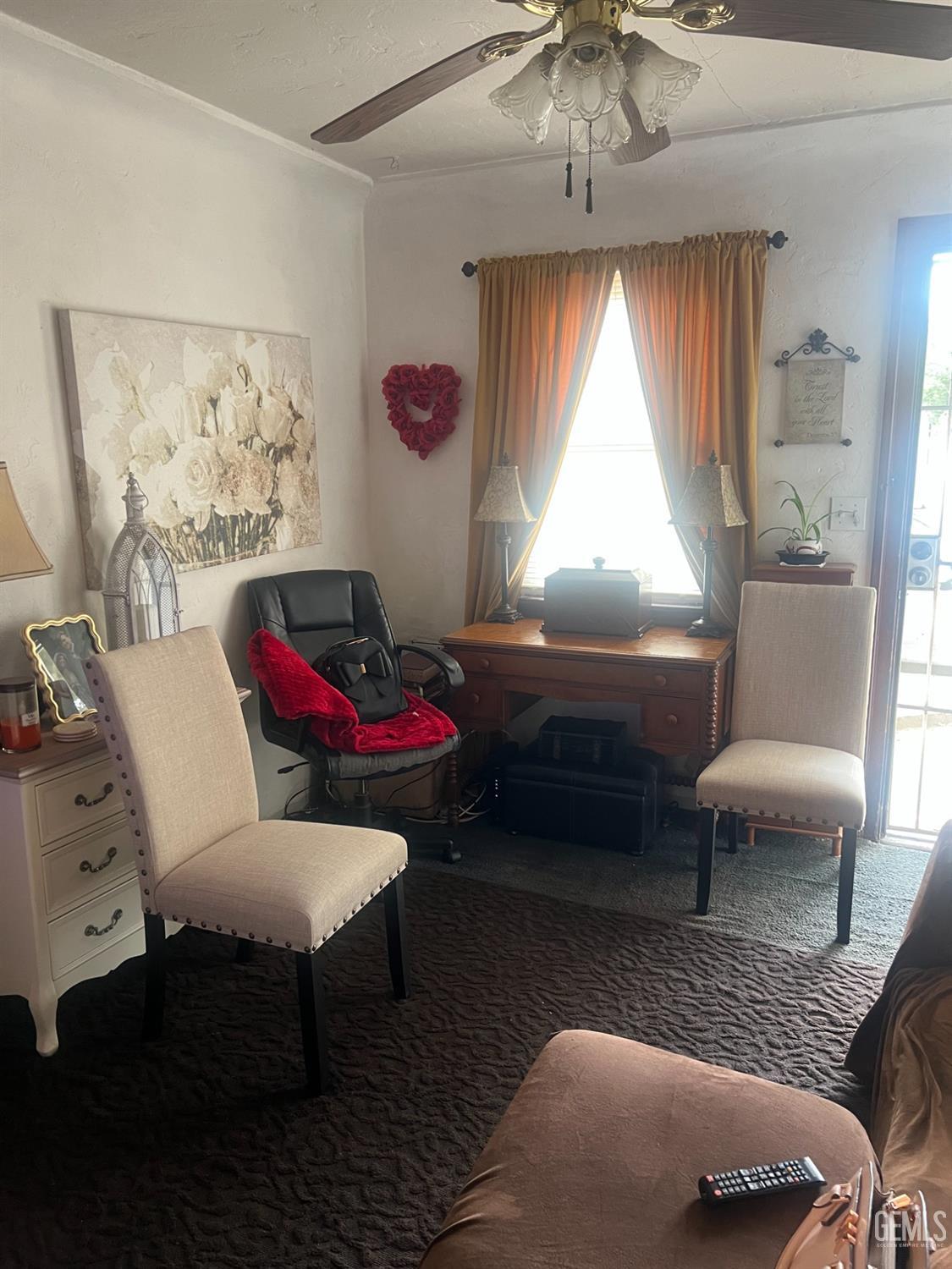 Undisclosed Address Visalia, CA 93291 - Photo 20 of 33 a living room with furniture and a large window