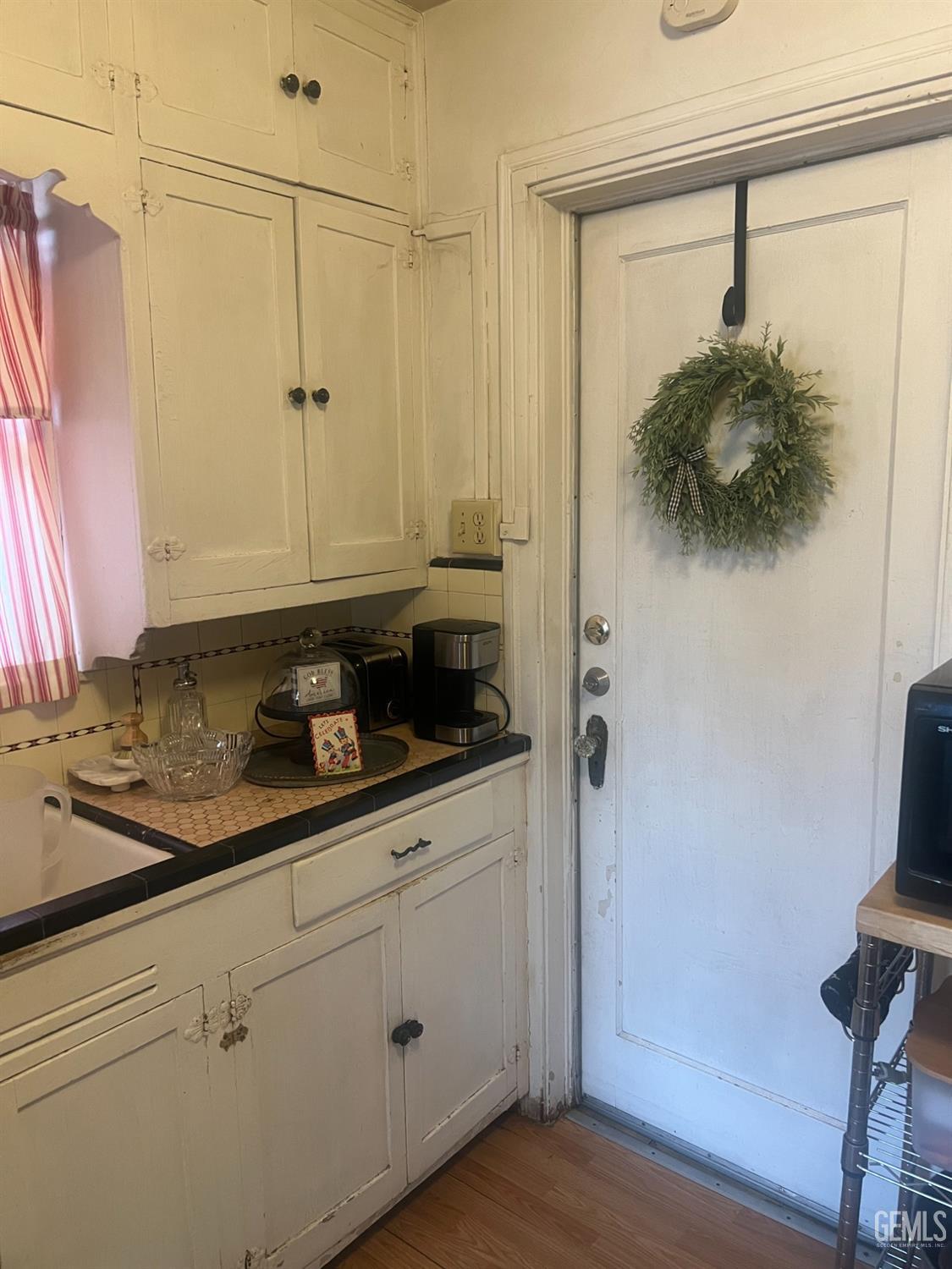 Undisclosed Address Visalia, CA 93291 - Photo 23 of 33 a bathroom with a sink and a mirror