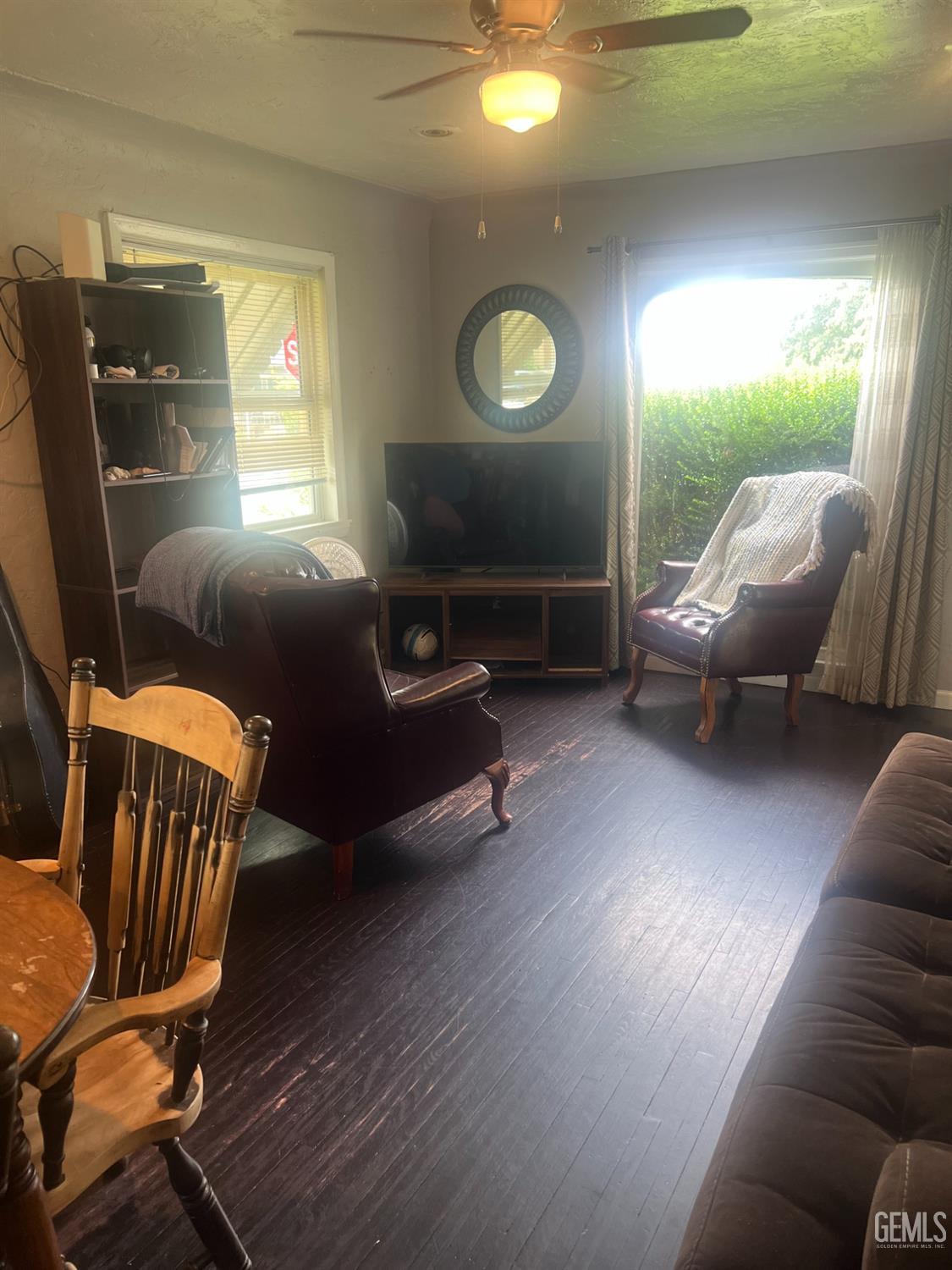 Undisclosed Address Visalia, CA 93291 - Photo 4 of 33 a living room with furniture and a window