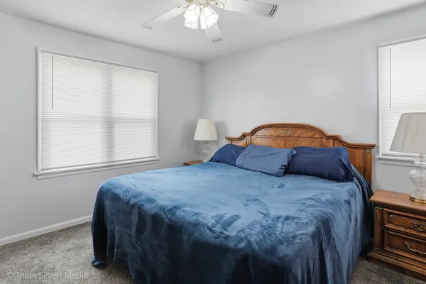 a room with a window and a wooden floor