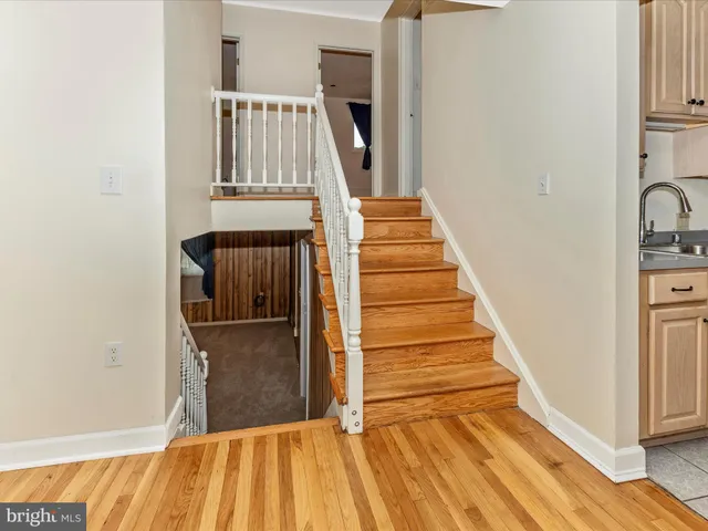 a bathroom with a tub a toilet a sink and a shower