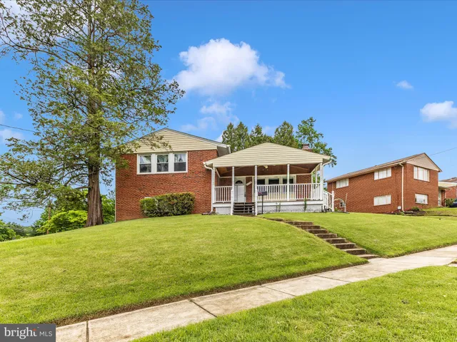 a view of a porch with wooden floor