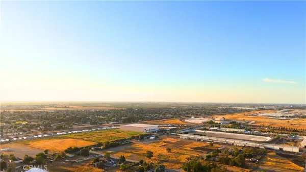 an aerial view of residential building with ocean view