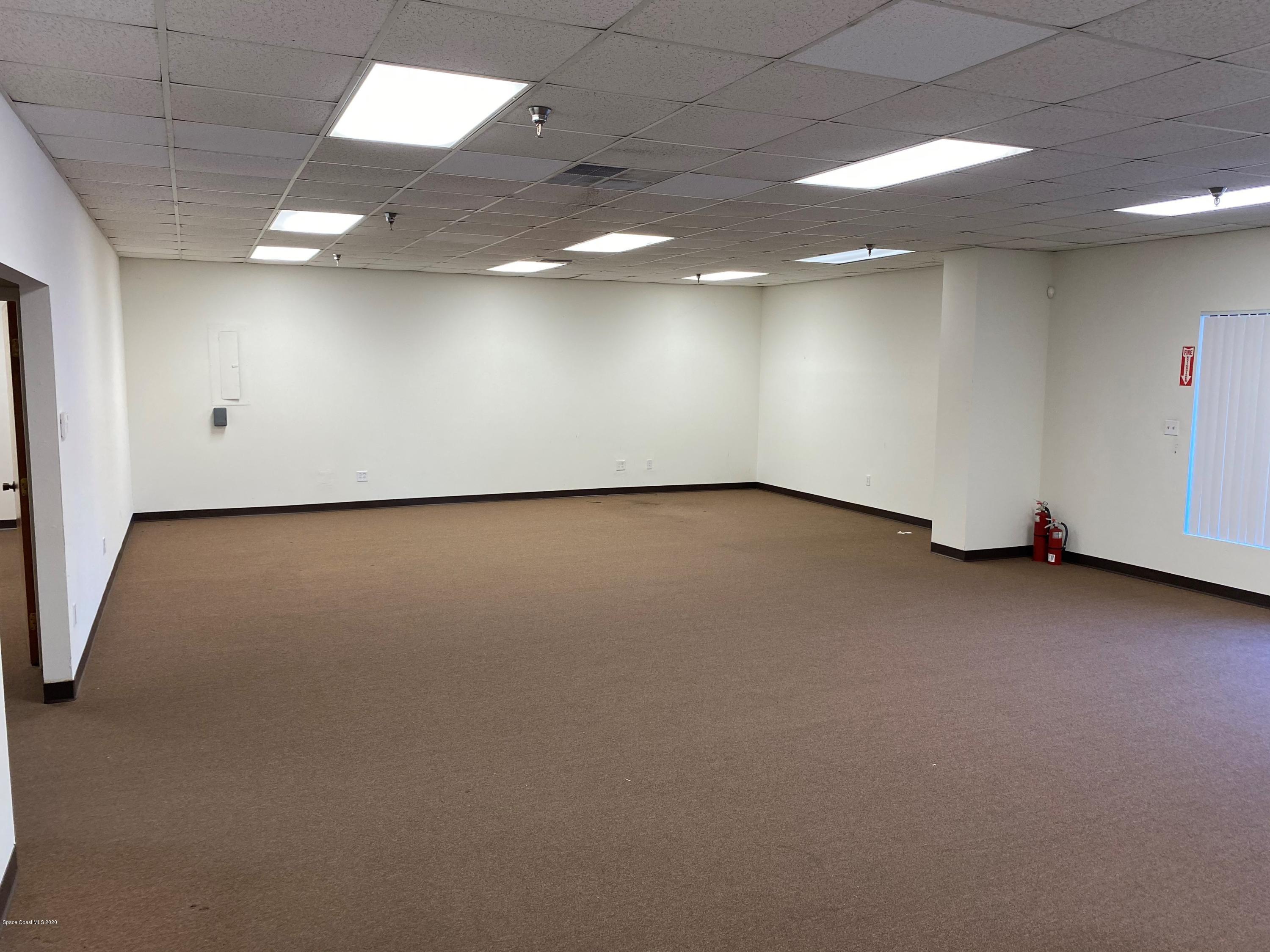 284 North Wickham Road Melbourne, FL 32935 - Photo 2 of 9 Showroom Office Reception 1