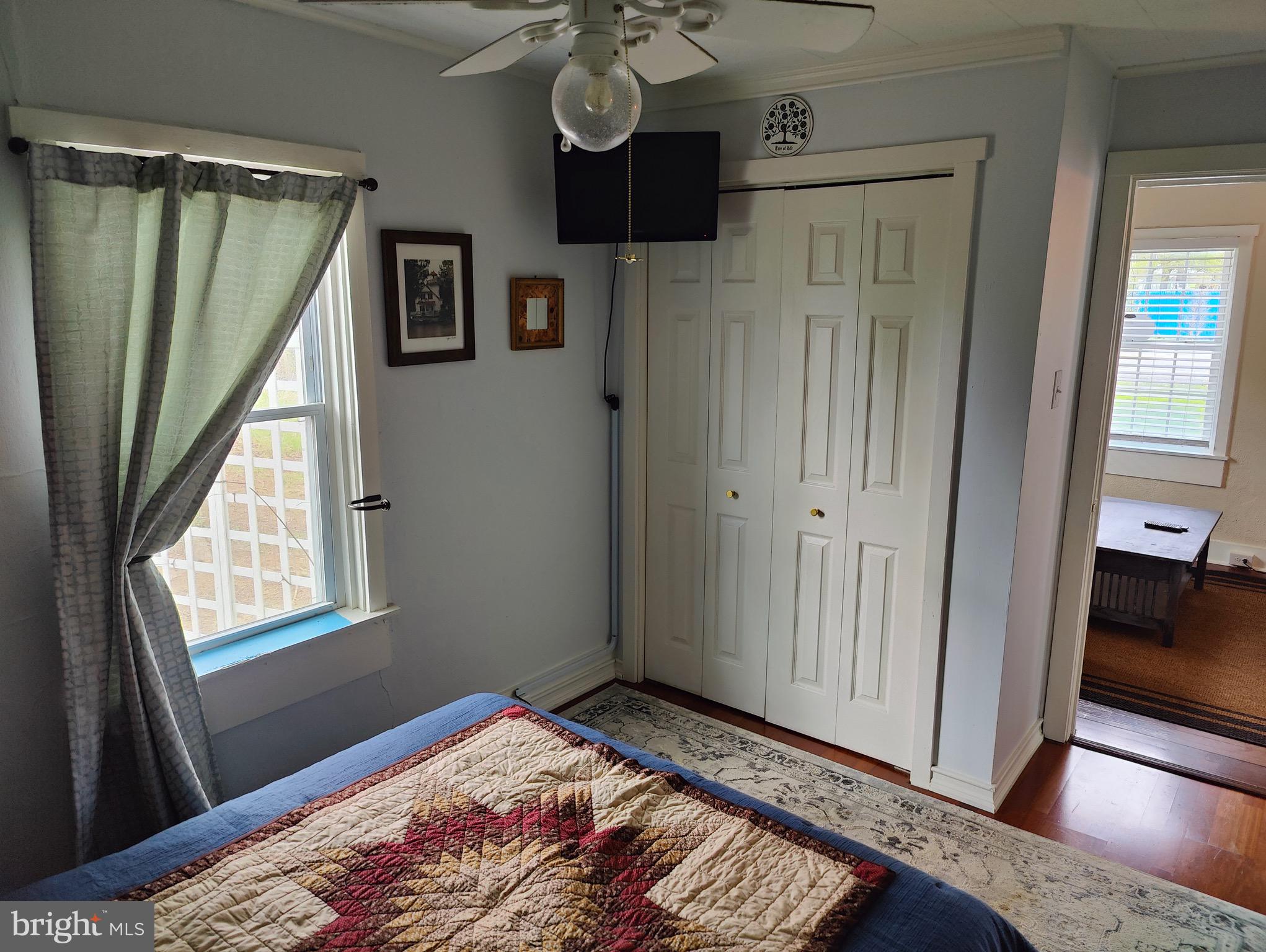 4884 Charles Town Road Kearneysville, WV 25430 - Photo 13 of 22 a bedroom with a bed and a window