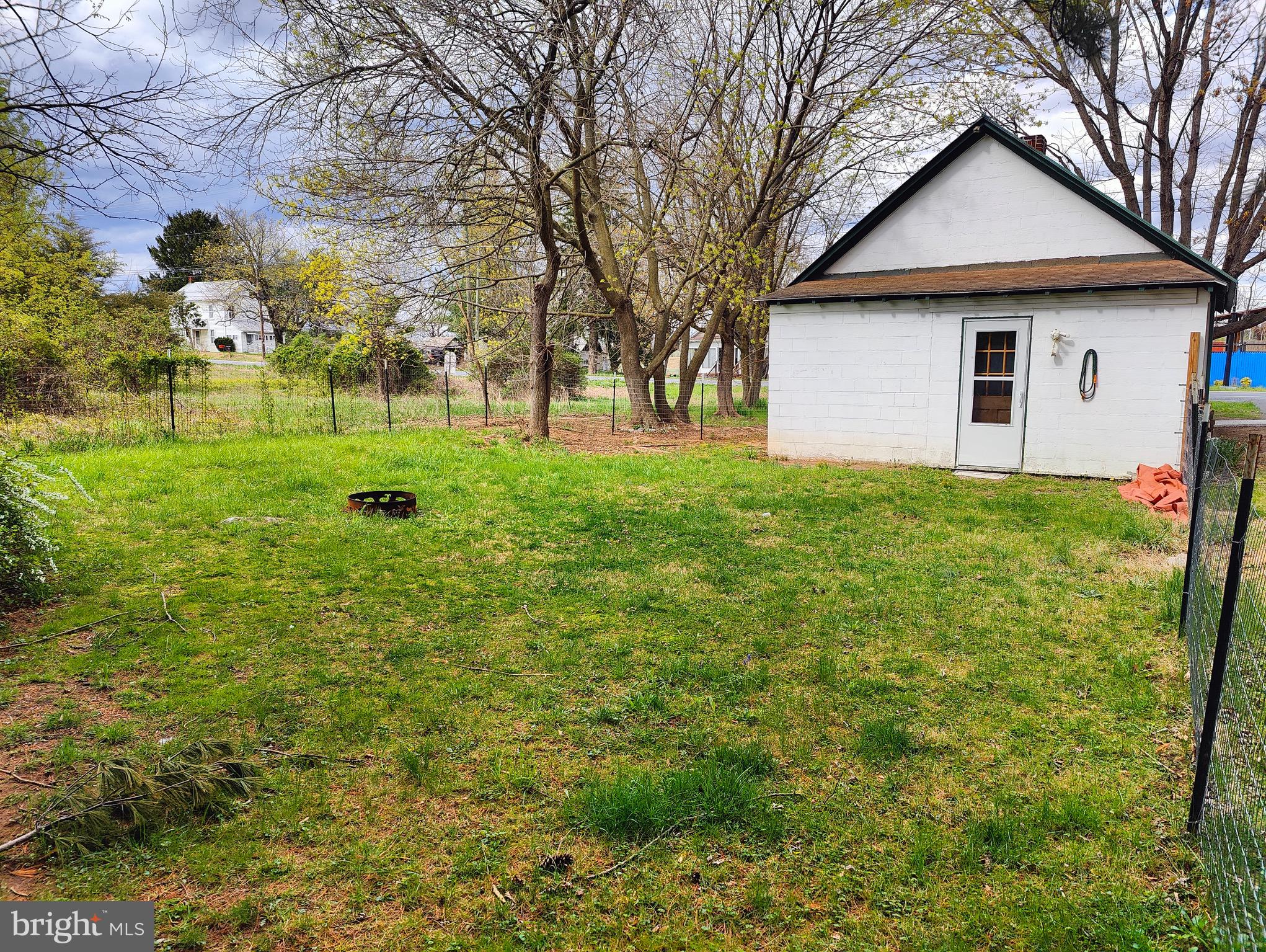 4884 Charles Town Road Kearneysville, WV 25430 - Photo 21 of 22 a view of a house with a backyard
