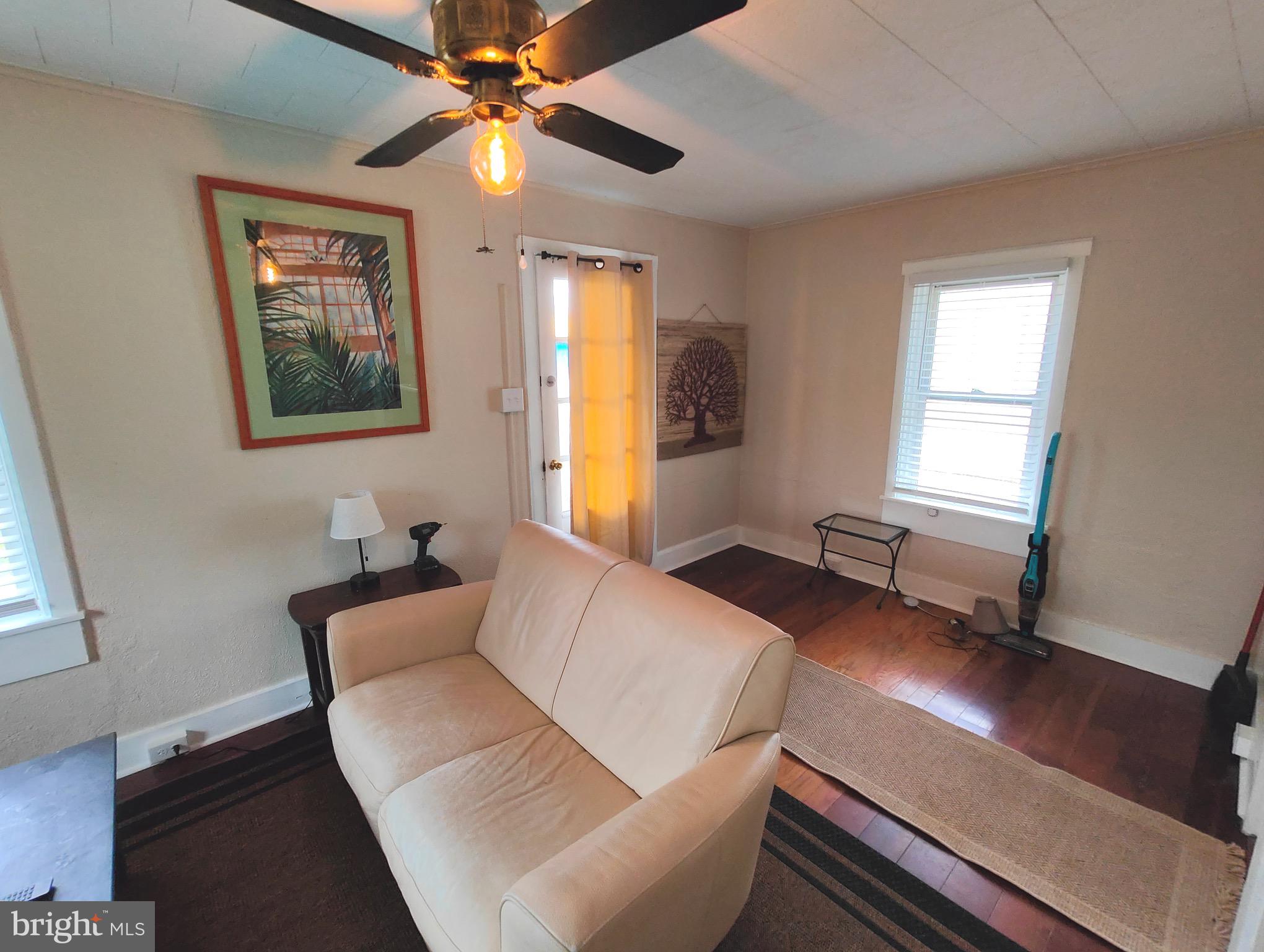 4884 Charles Town Road Kearneysville, WV 25430 - Photo 8 of 22 a living room with furniture and a window